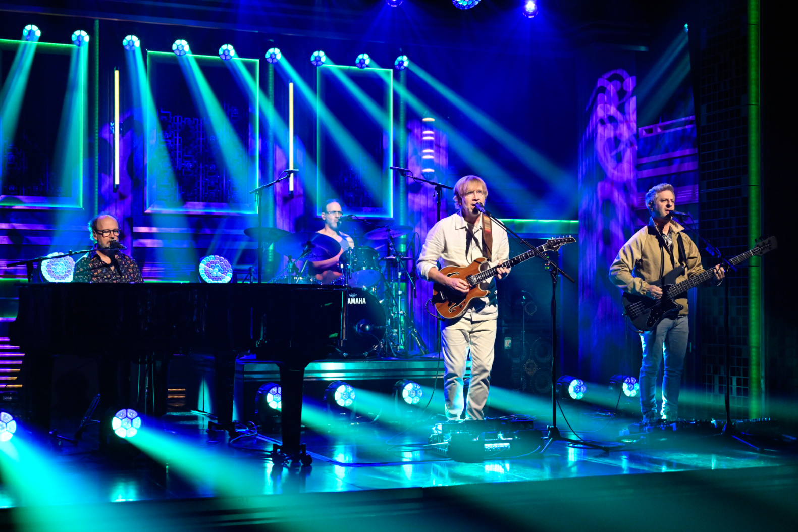 Phish performing live on stage